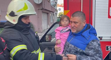 Kapıları kilitlenen kamyonette mahsur kalan çocuğu itfaiye kurtardı