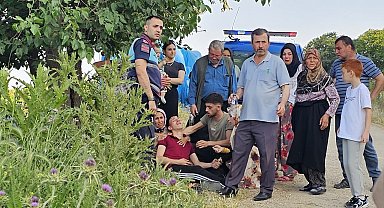 Bursa'da traktör römorkuyla yamaçtan yuvarlanan çocuk yaralandı