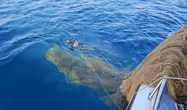 Muğla'da denizde hayalet ağ temizliği