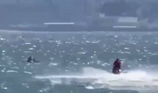 Rüzgarla açığa sürüklenen SUP'taki anne ve kızı cankurtaranlar kurtardı